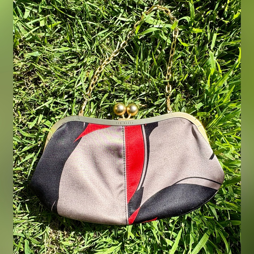 Ted Baker Black and Red Clutch with Bold Design